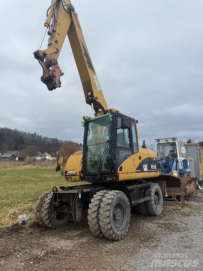 CAT M 313 C Wielgraafmachines