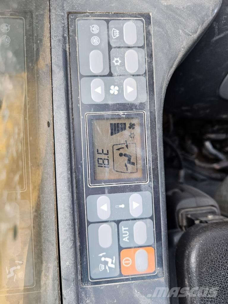 CAT 323 Rupsgraafmachines