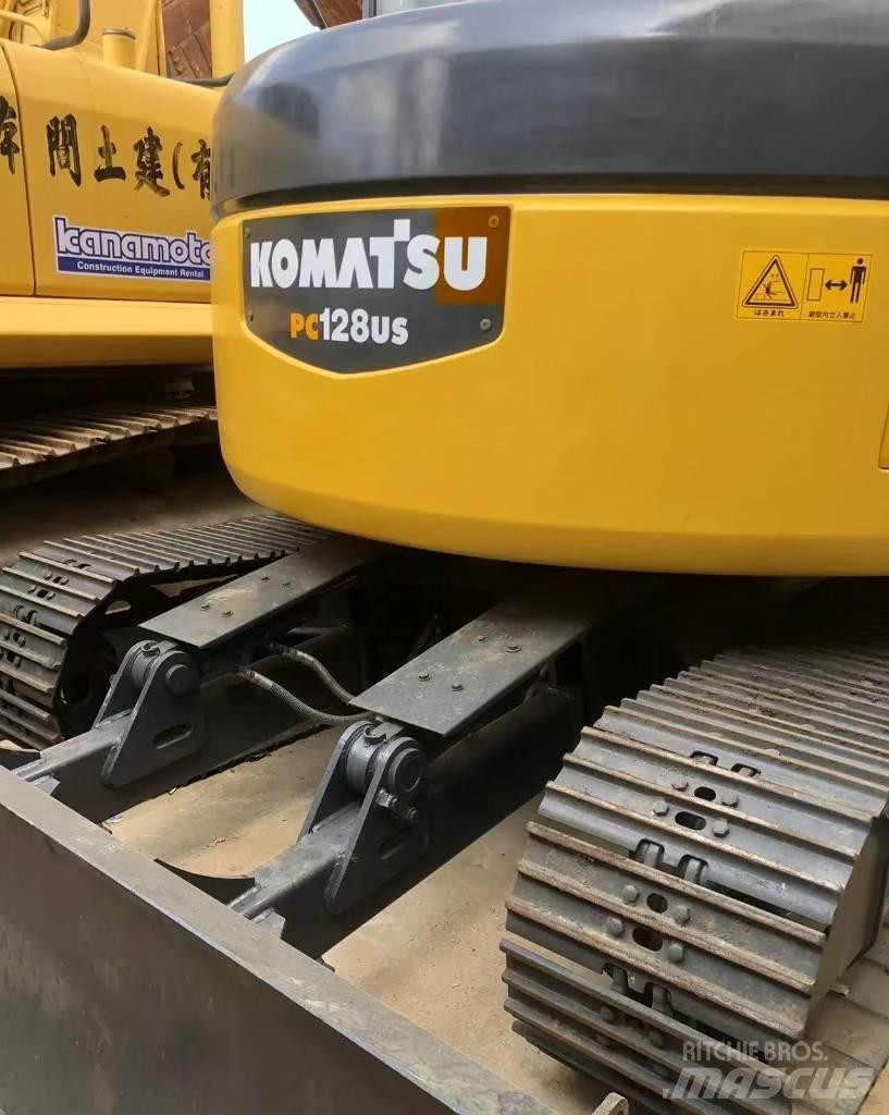 Komatsu 128 US Rupsgraafmachines