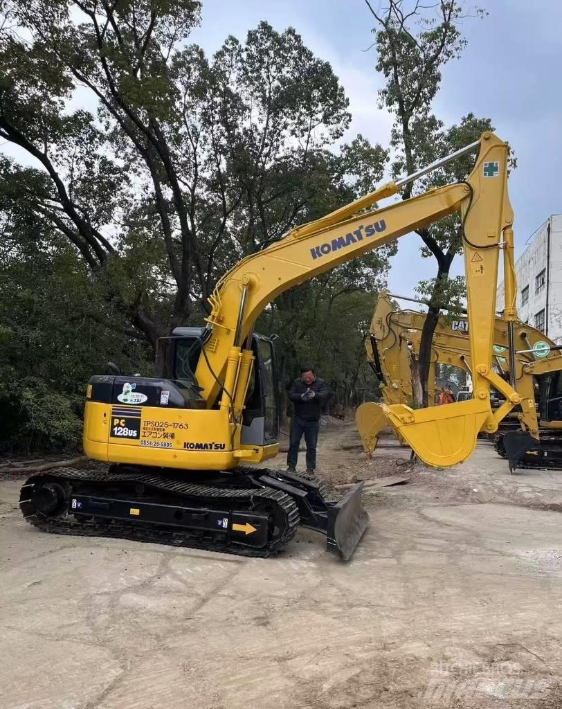 Komatsu 128 US Rupsgraafmachines