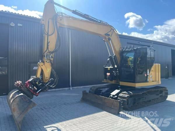CAT 310 Rupsgraafmachines