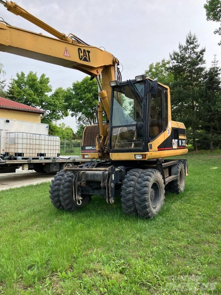 CAT M 312 Wielgraafmachines