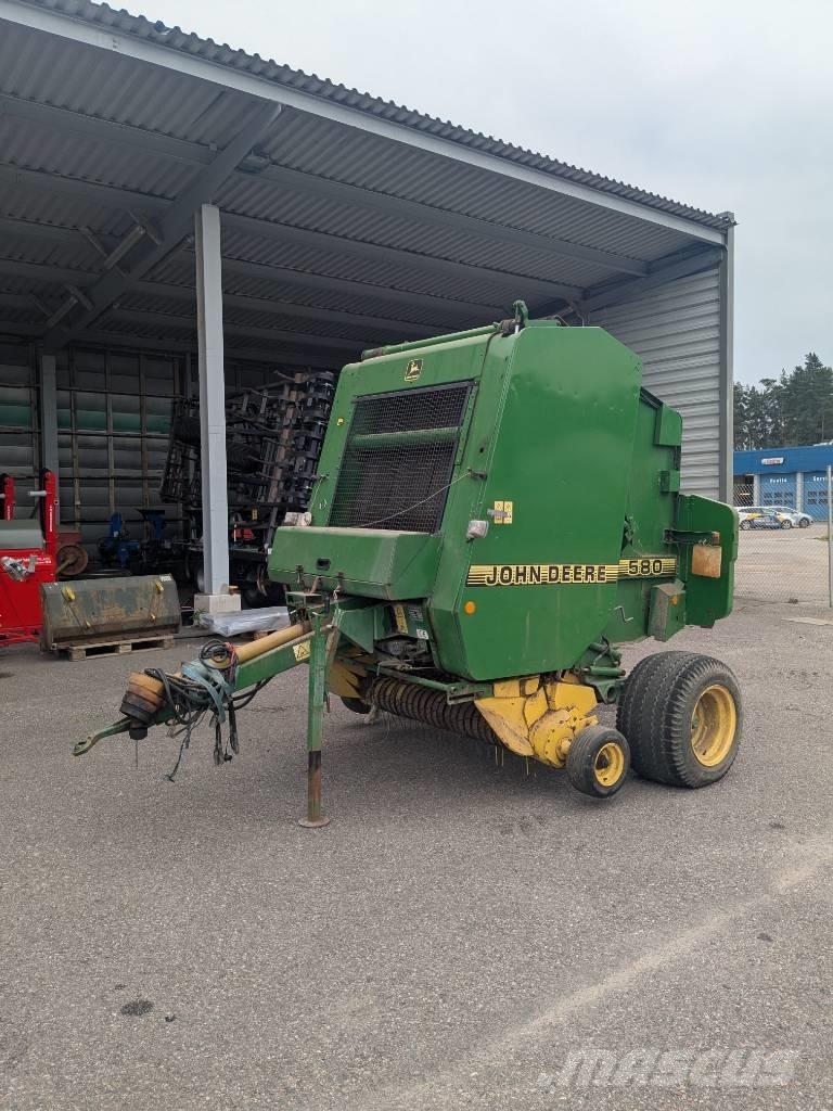 John Deere 580 Ronde-balenpersen