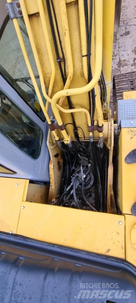 New Holland 215 B Rupsgraafmachines