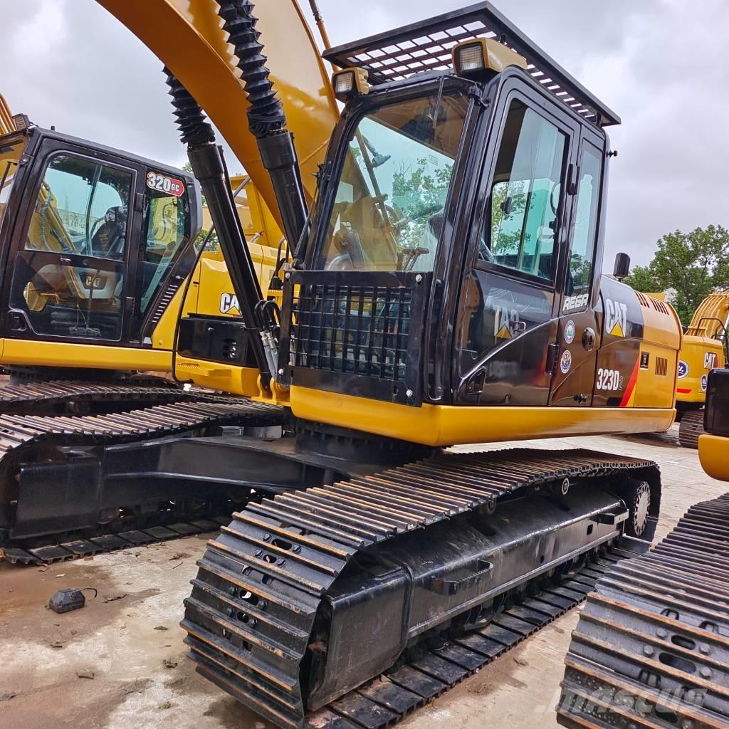 CAT 323 D Rupsgraafmachines