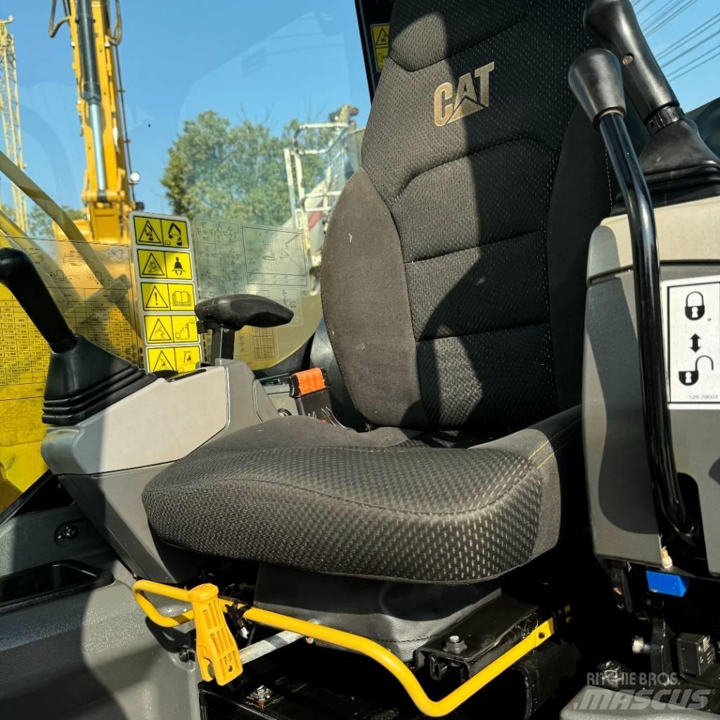 CAT 310 Rupsgraafmachines