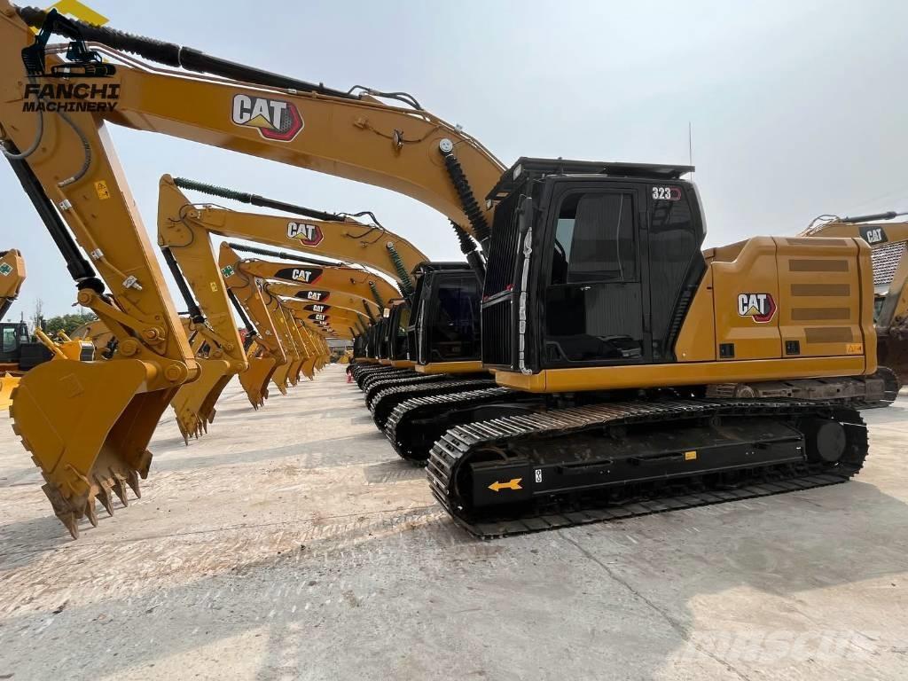 CAT 323 Rupsgraafmachines