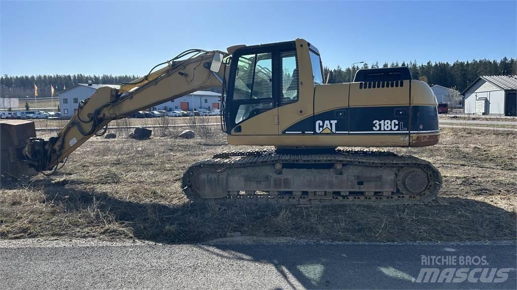 CAT 318 C Rupsgraafmachines