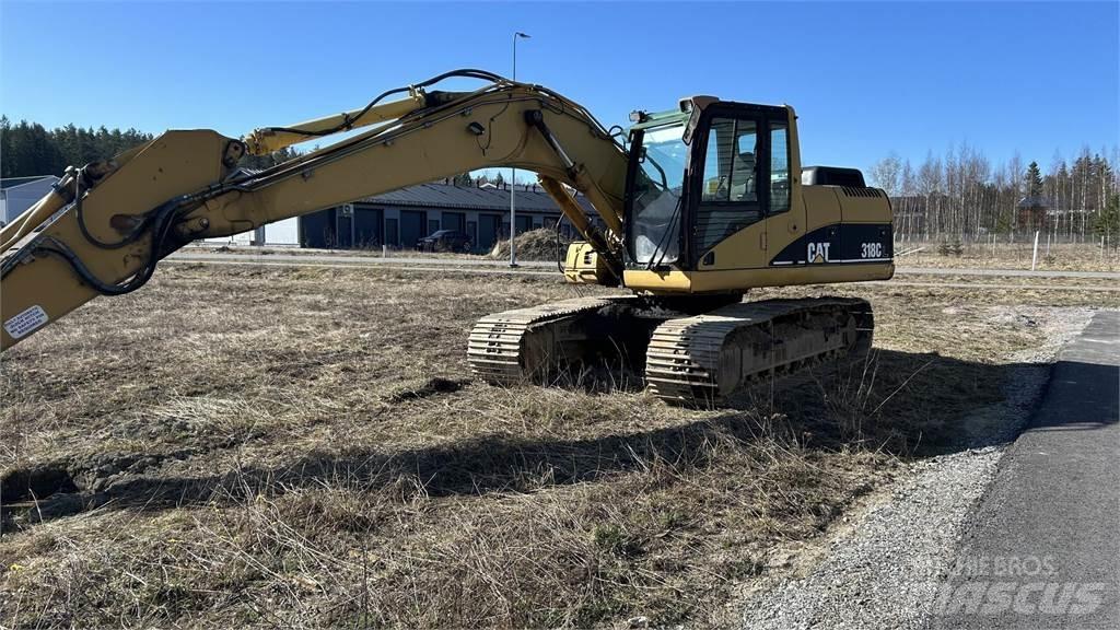 CAT 318 C Rupsgraafmachines
