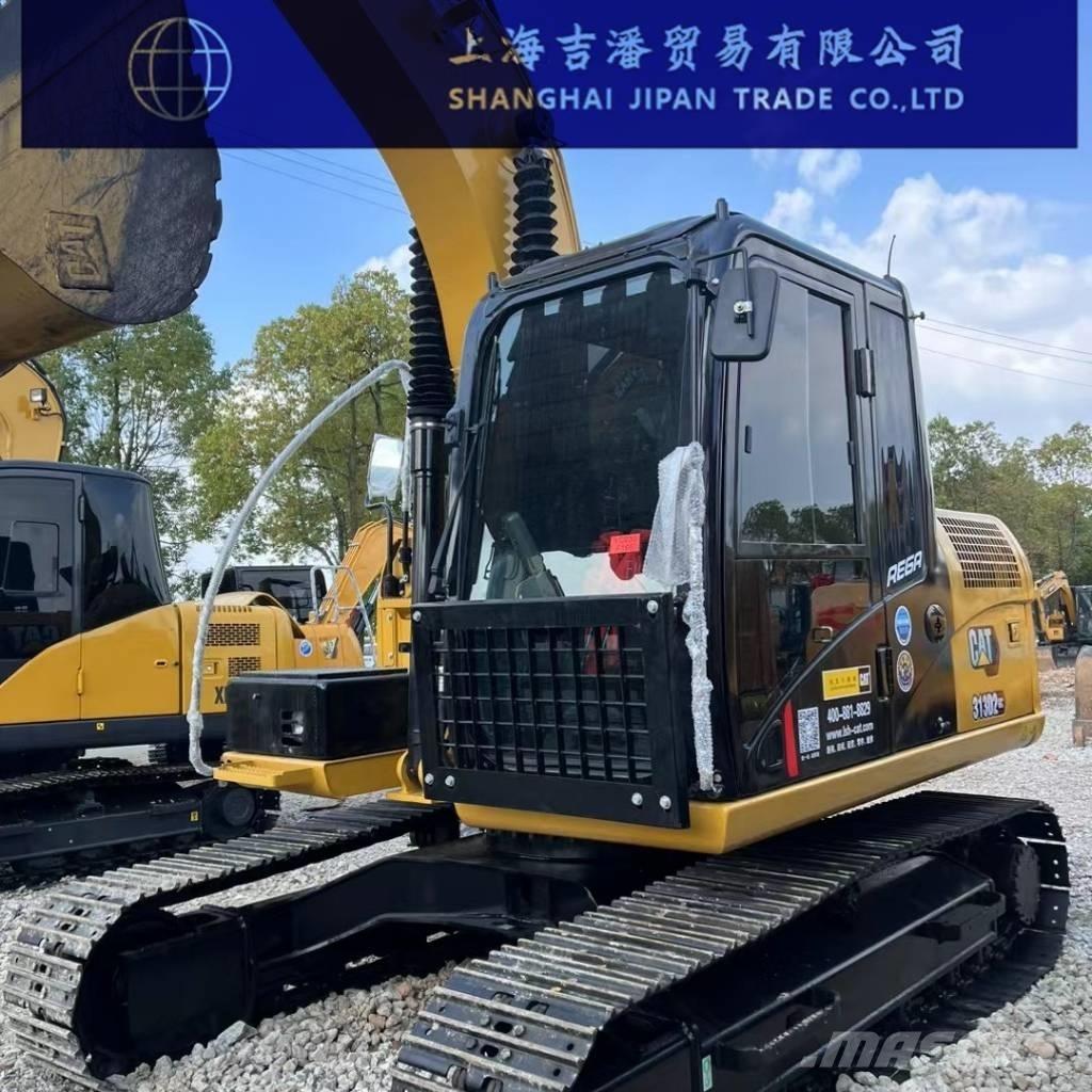 CAT 313 Rupsgraafmachines
