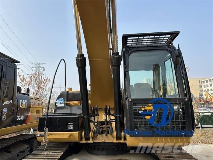 CAT 323D/323/323DL Rupsgraafmachines