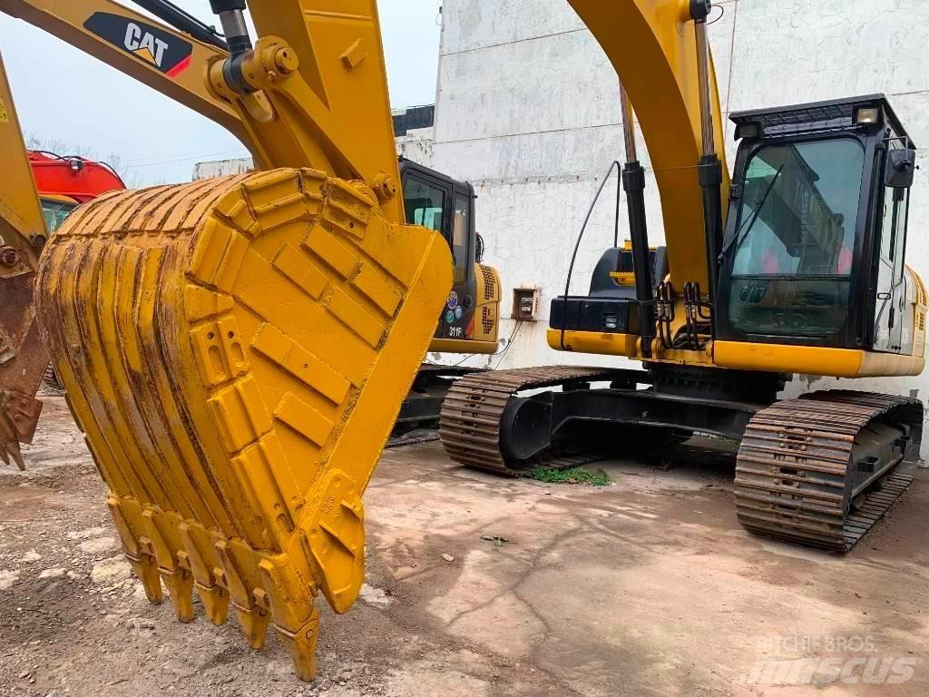 CAT 323 D L Rupsgraafmachines
