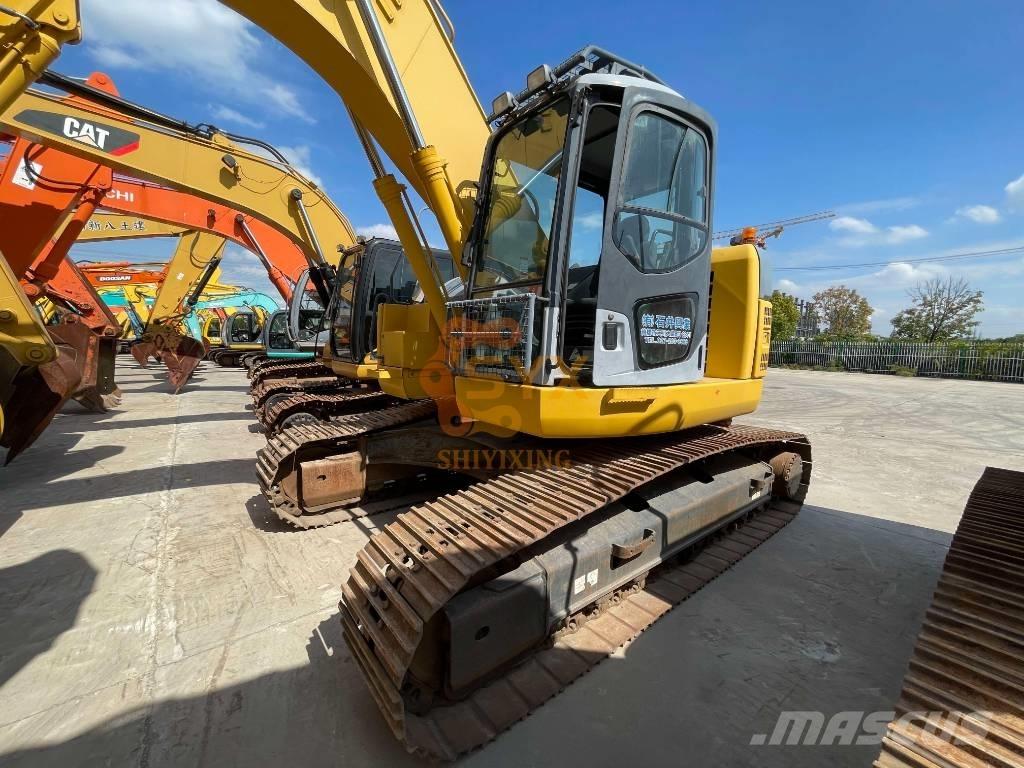 Komatsu PC 228 US Rupsgraafmachines