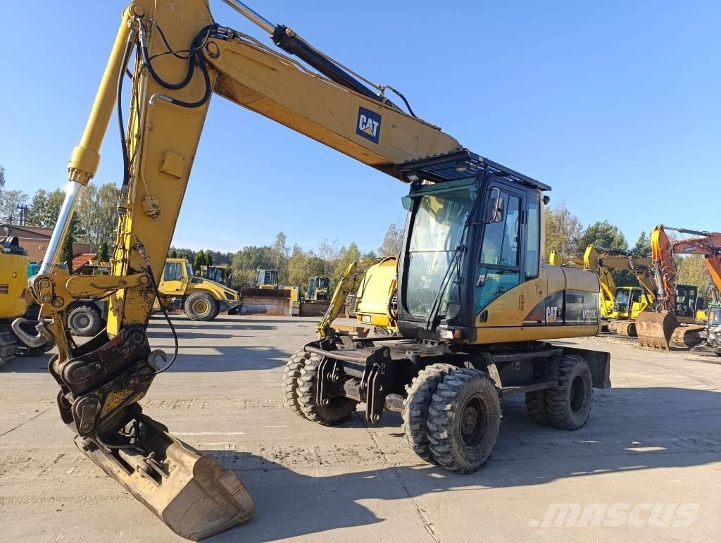 CAT M 318 C Wielgraafmachines