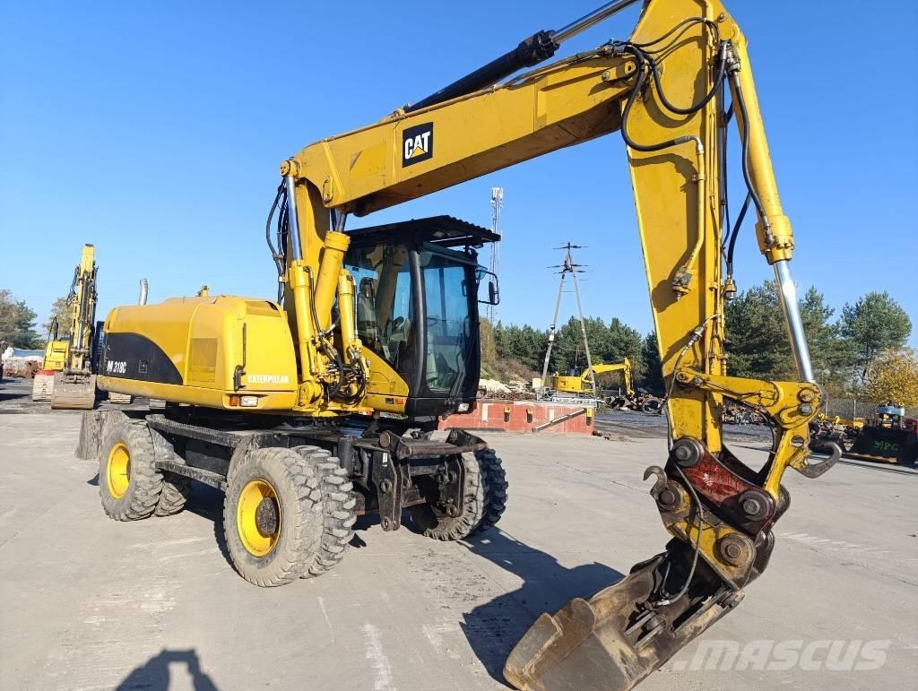 CAT M 318 C Wielgraafmachines