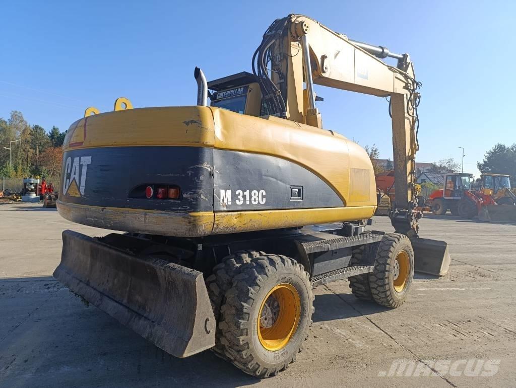 CAT M 318 C Wielgraafmachines