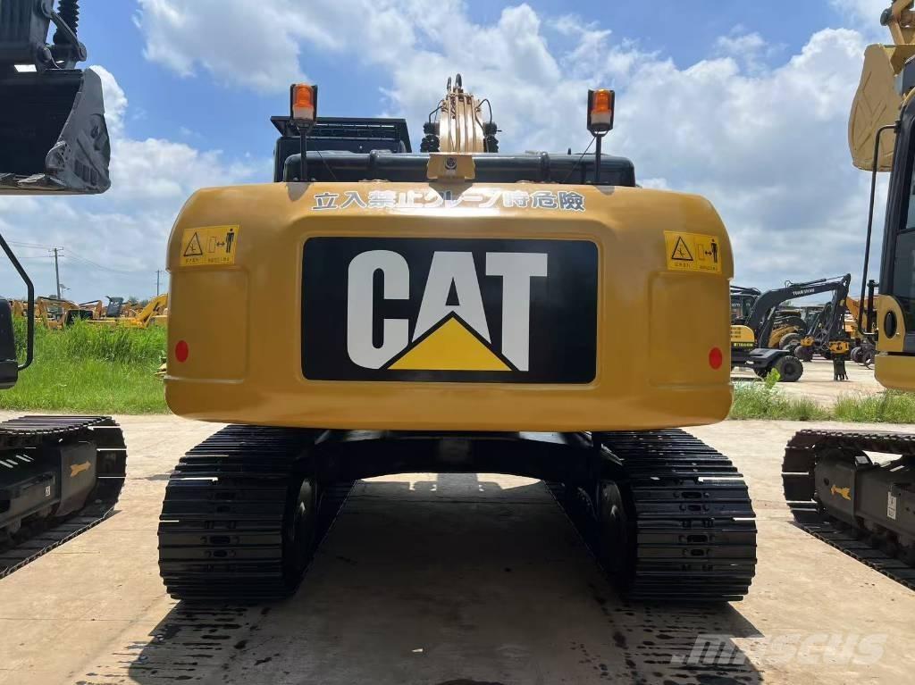 CAT 323 D Rupsgraafmachines