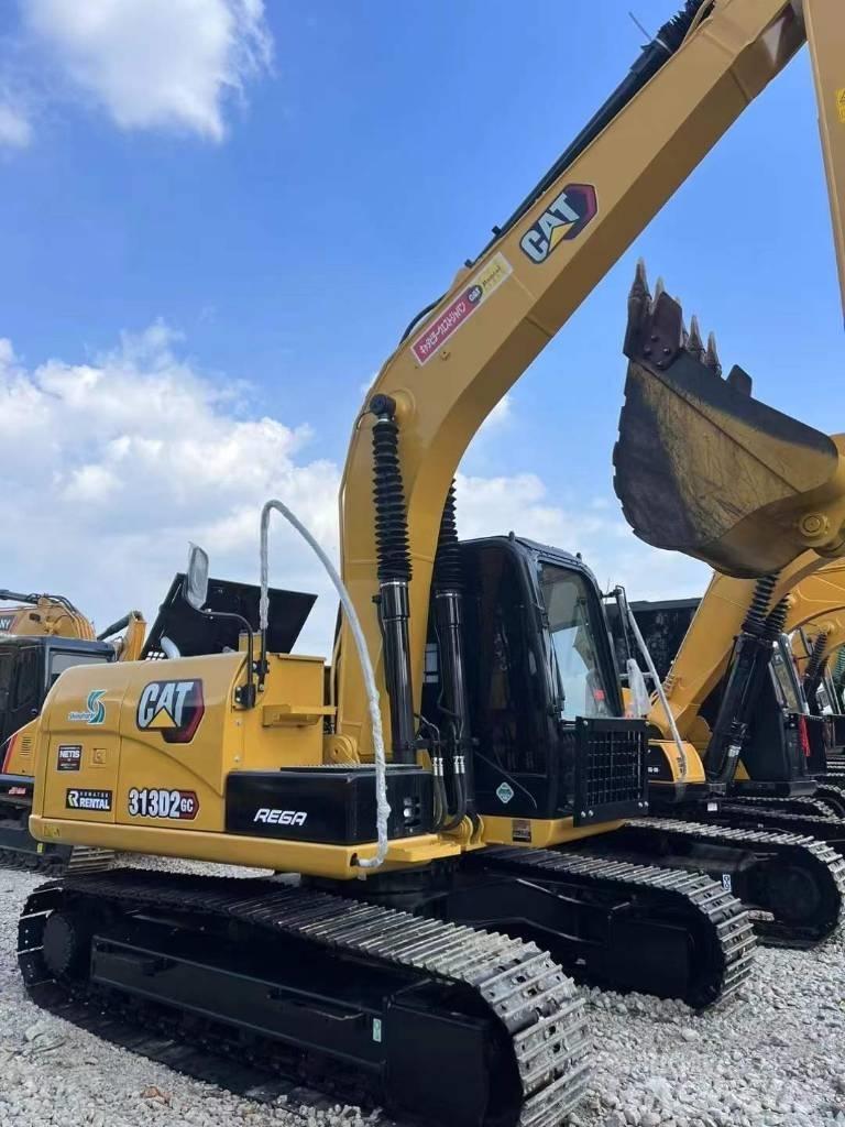 CAT 313 B Rupsgraafmachines