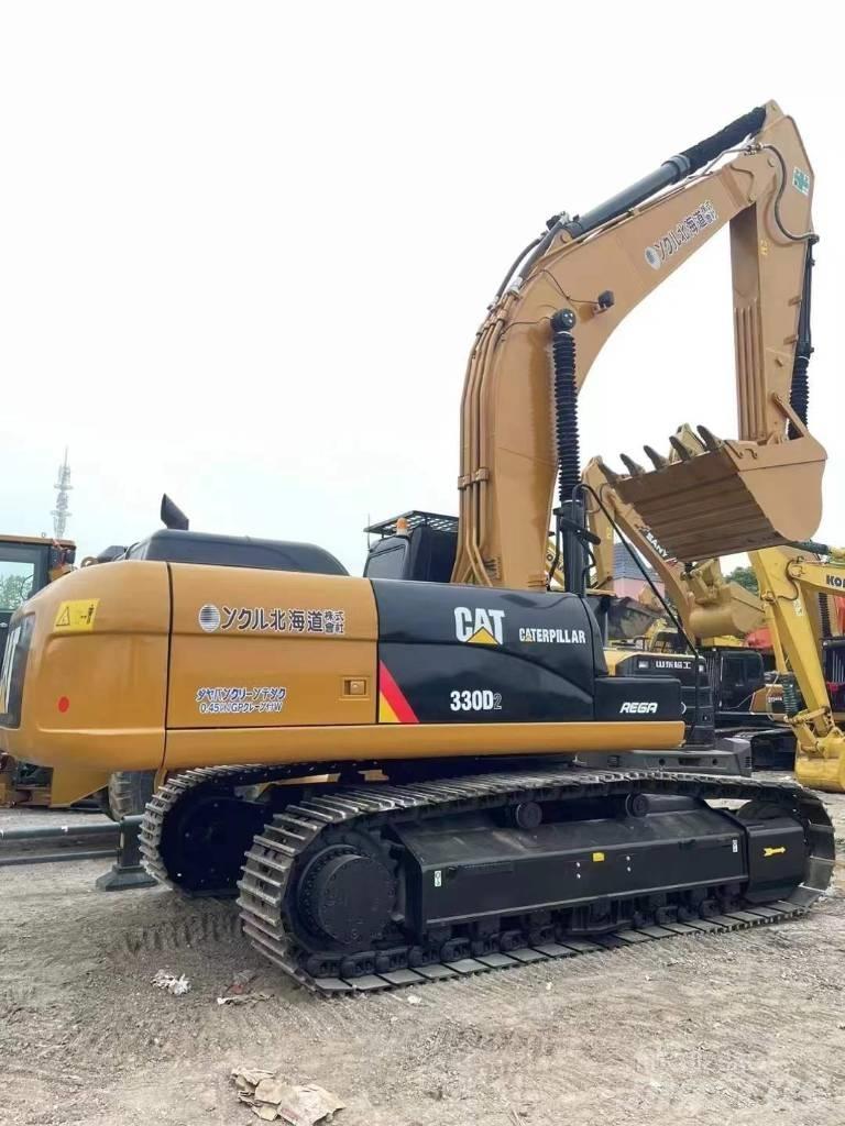 CAT 330 Rupsgraafmachines