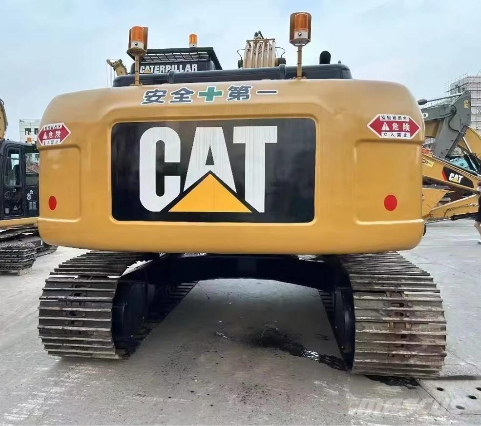 CAT 323 D Rupsgraafmachines