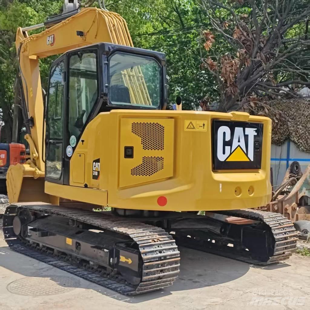 CAT 310 Midigraafmachines 7t - 12t