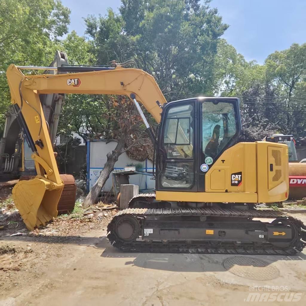 CAT 310 Midigraafmachines 7t - 12t