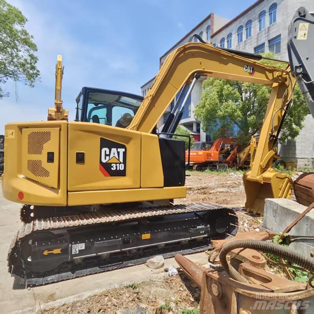 CAT 310 Midigraafmachines 7t - 12t