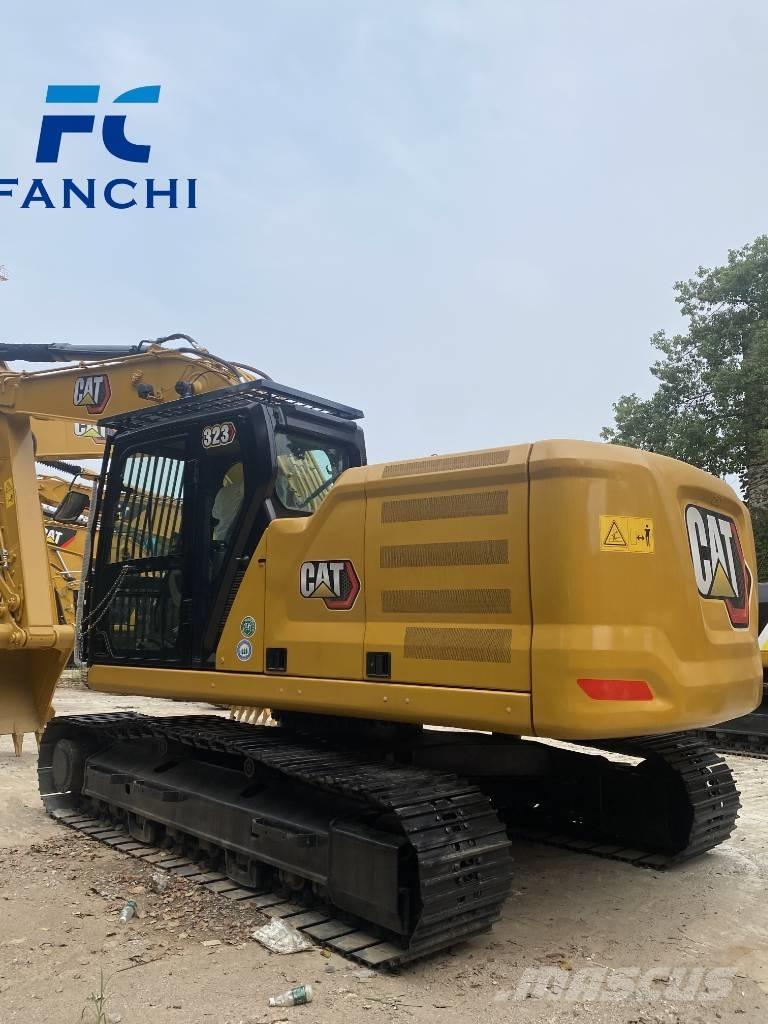 CAT 323 Rupsgraafmachines
