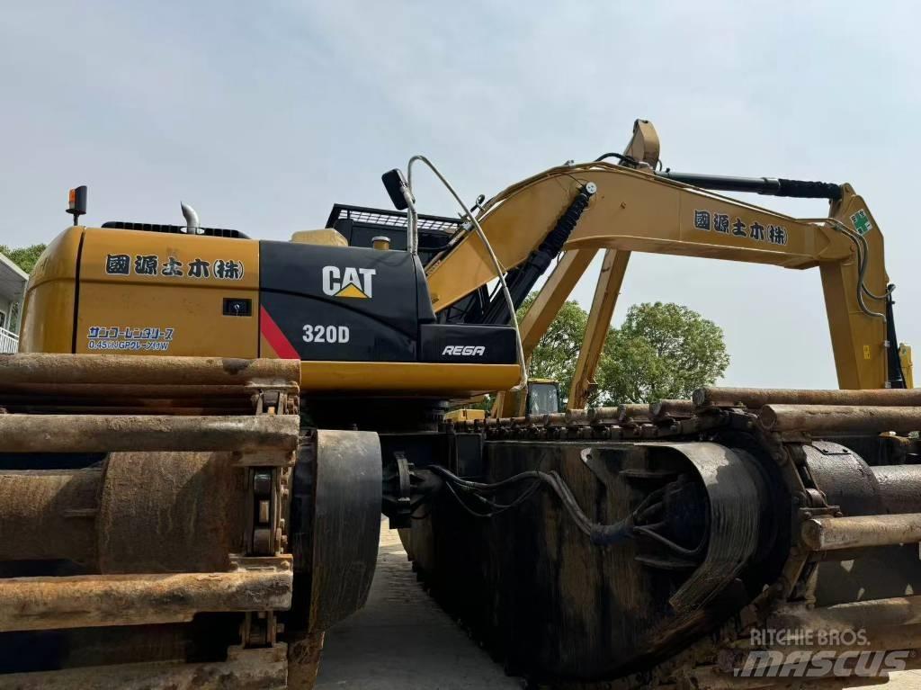 CAT 320 D Amfibische graafmachines