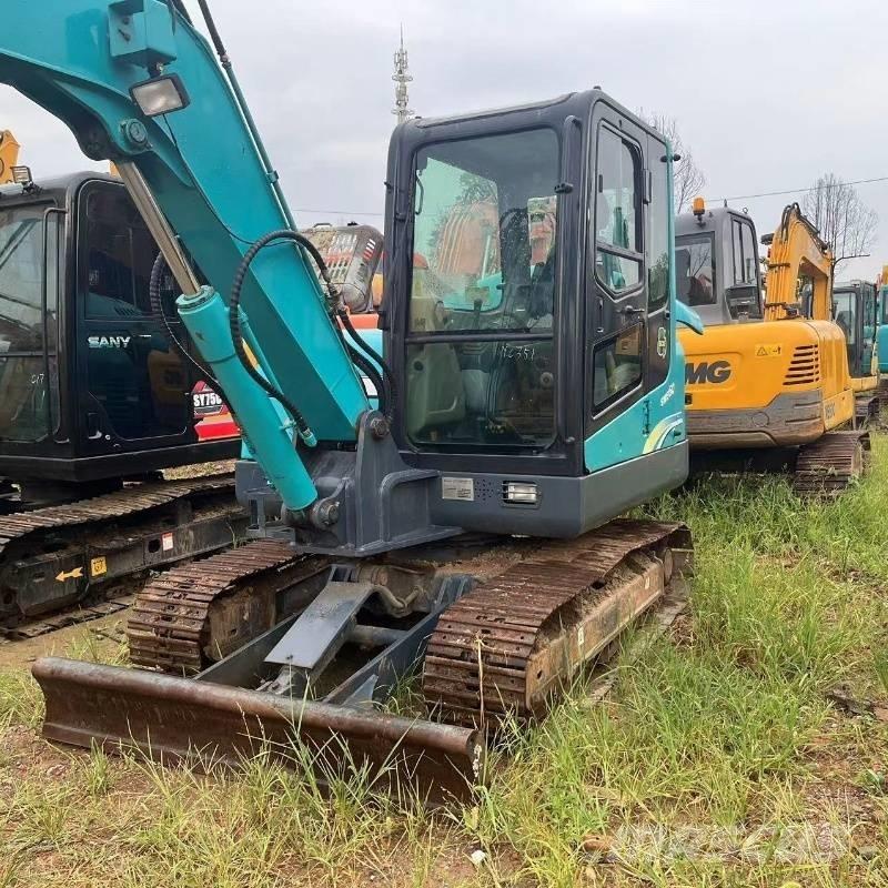 Sunward SWE 60 Rupsgraafmachines