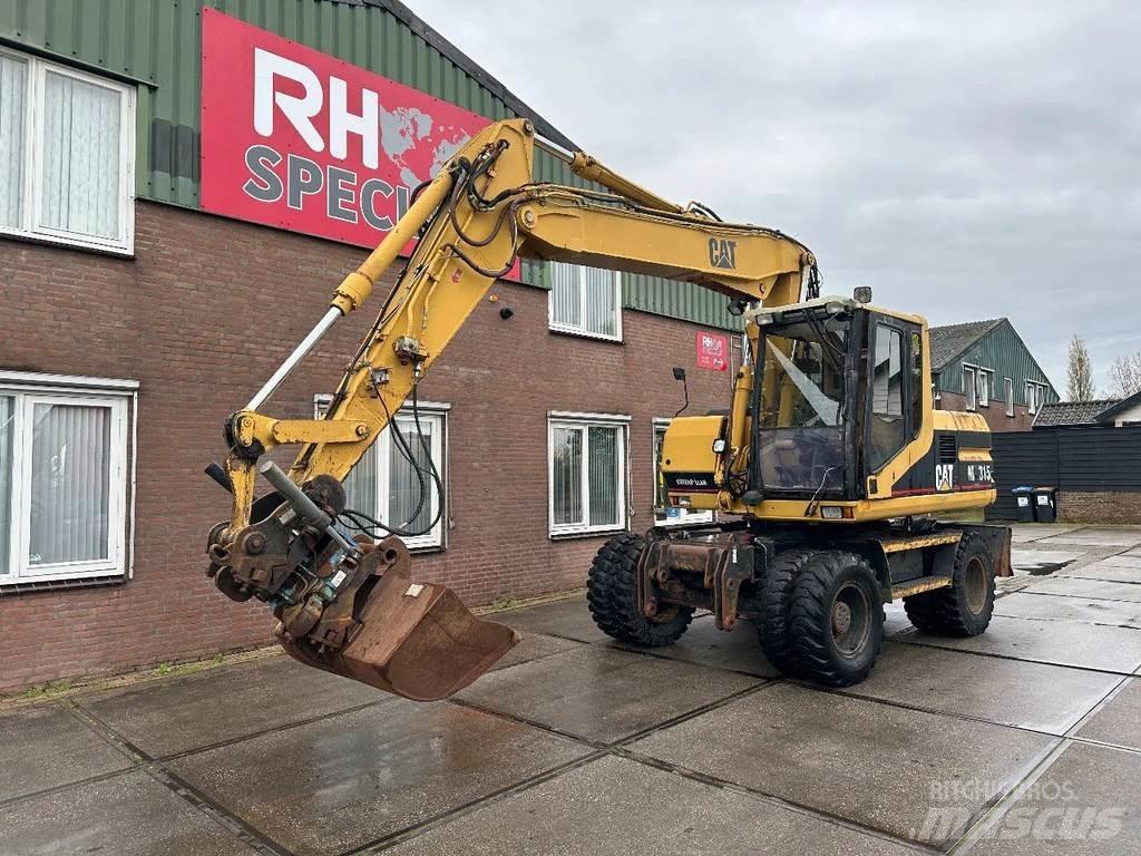 CAT M315 +ROTO CE Wielgraafmachines