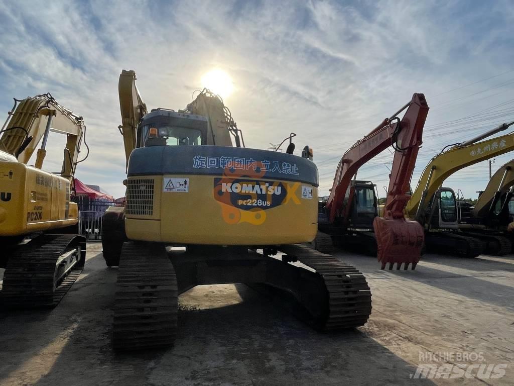 Komatsu PC 228 US Rupsgraafmachines