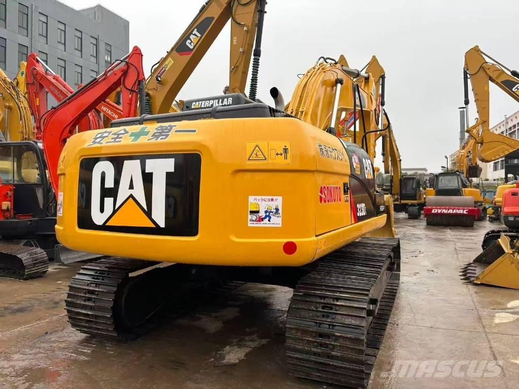 CAT 323 D Rupsgraafmachines