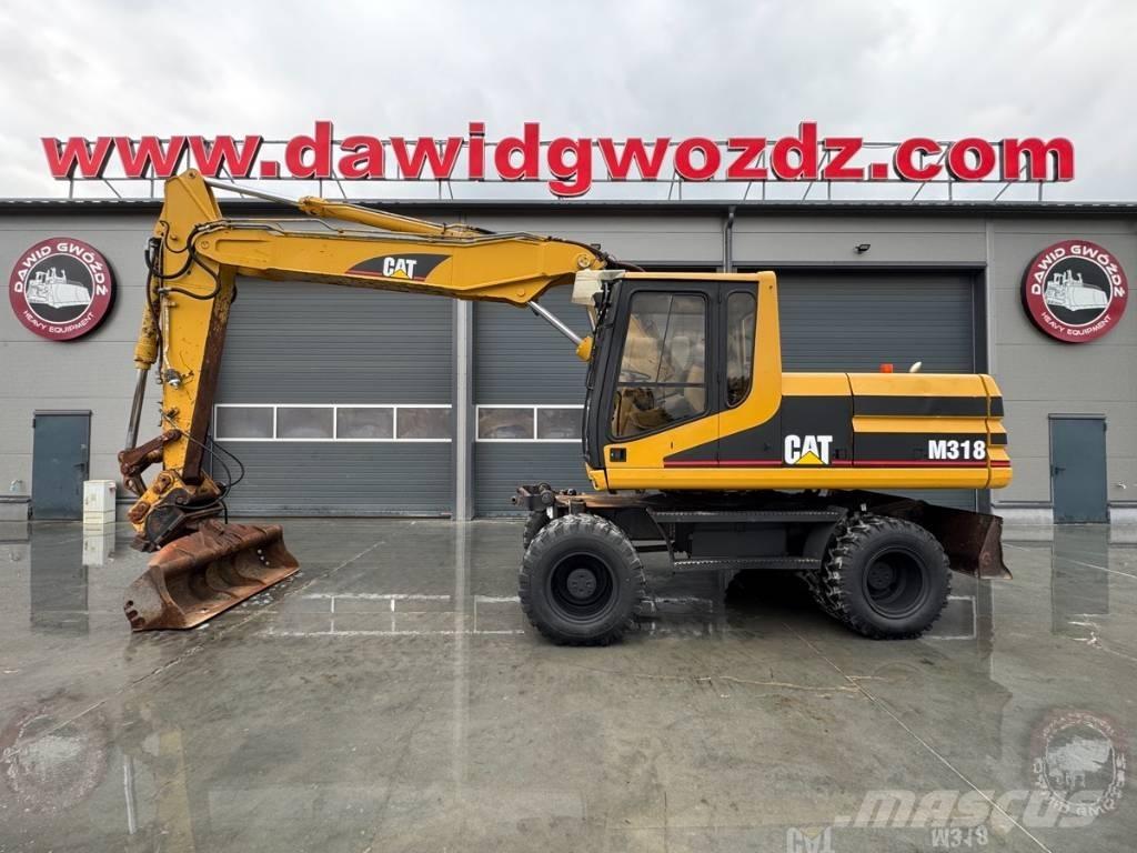 CAT M 318 Wielgraafmachines