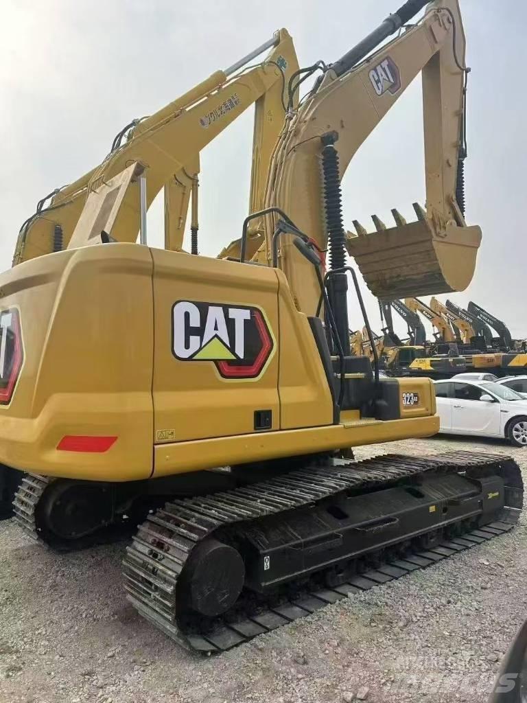 CAT 323 Rupsgraafmachines