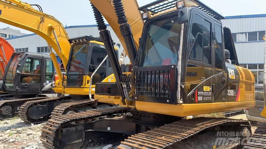 CAT 326 Rupsgraafmachines
