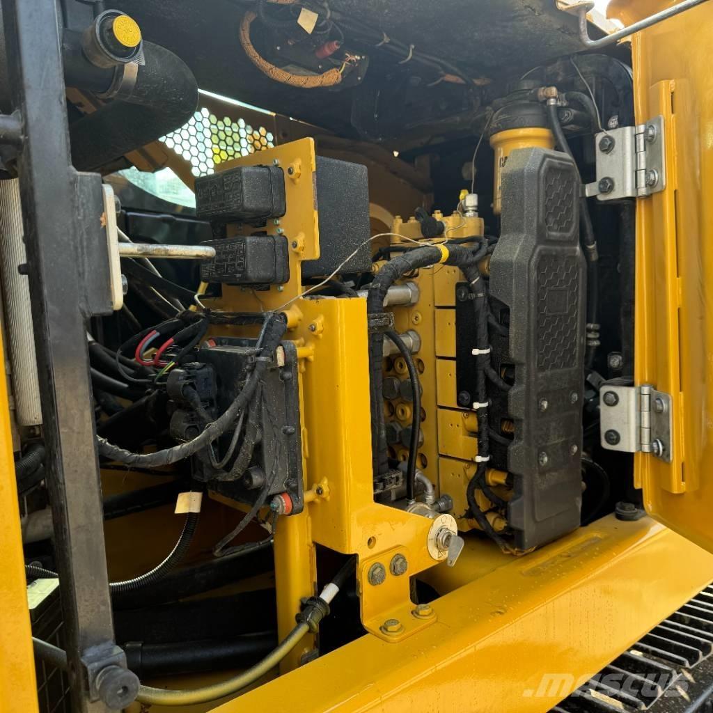CAT 310 Rupsgraafmachines