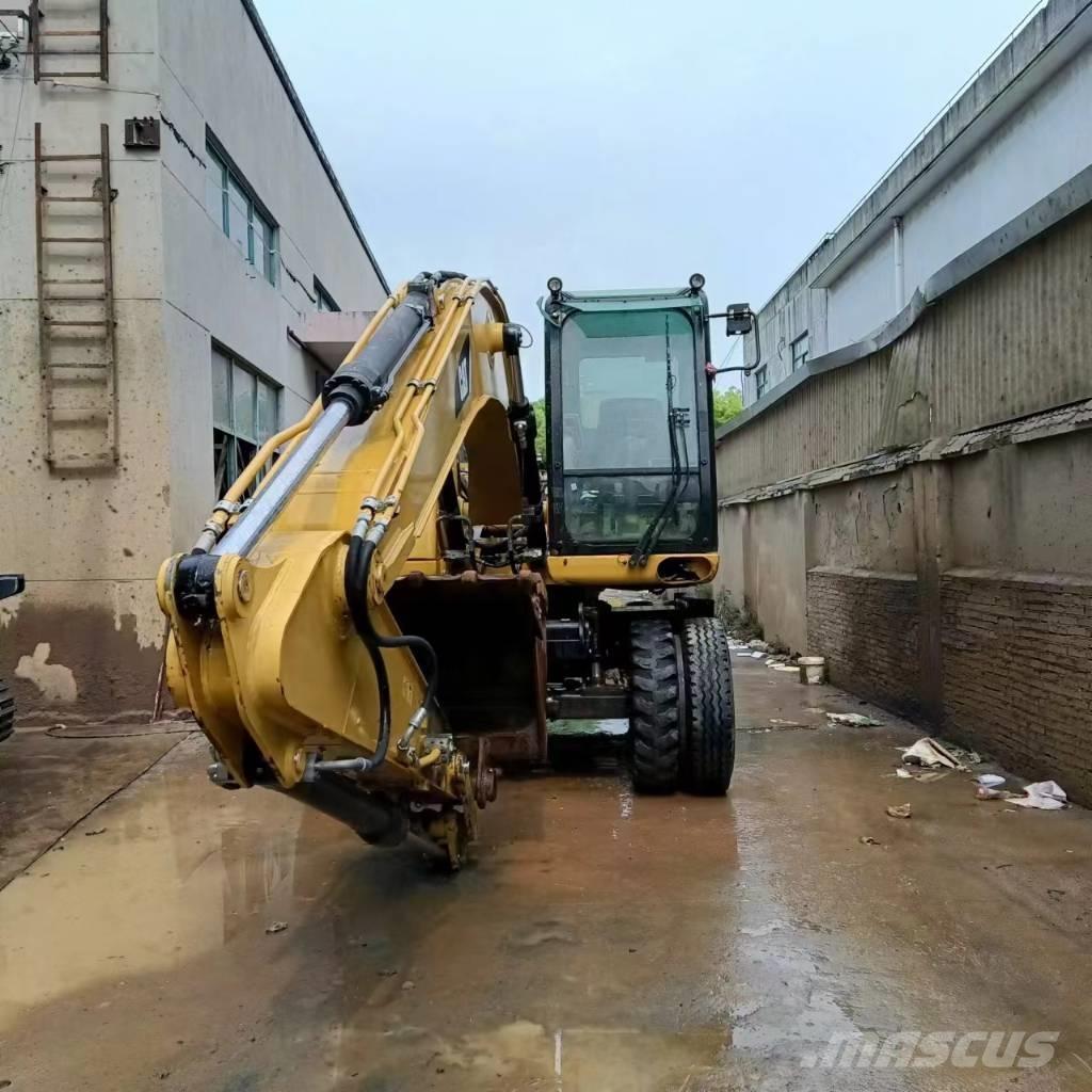CAT M315D2 Wielgraafmachines
