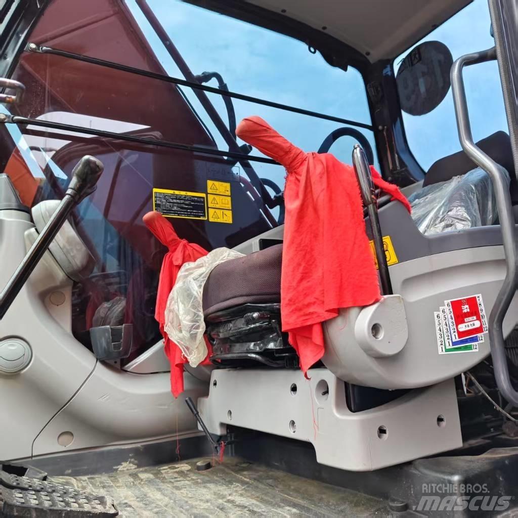 Hitachi ZX 210 Rupsgraafmachines