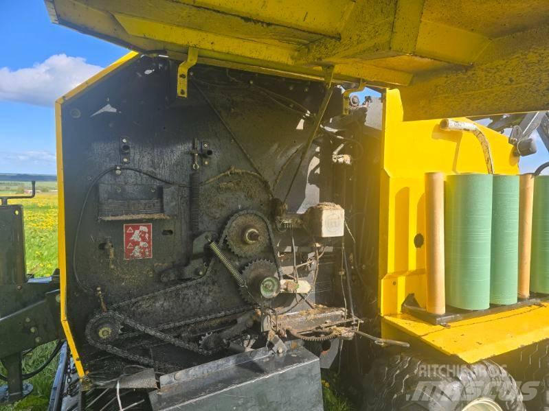 New Holland BR 560 Ronde-balenpersen