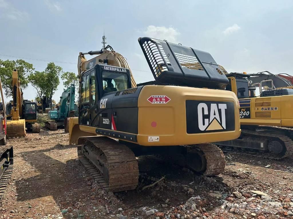 CAT 326 Rupsgraafmachines