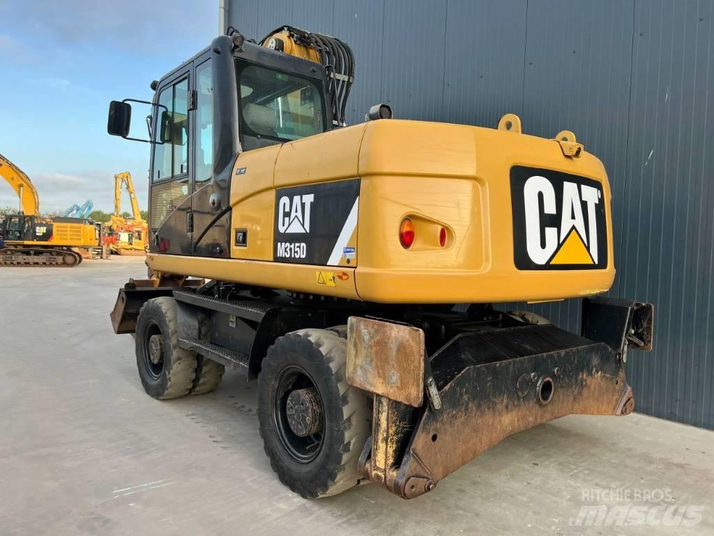 CAT M315D Wielgraafmachines