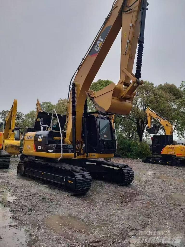 CAT 323D2 Rupsgraafmachines