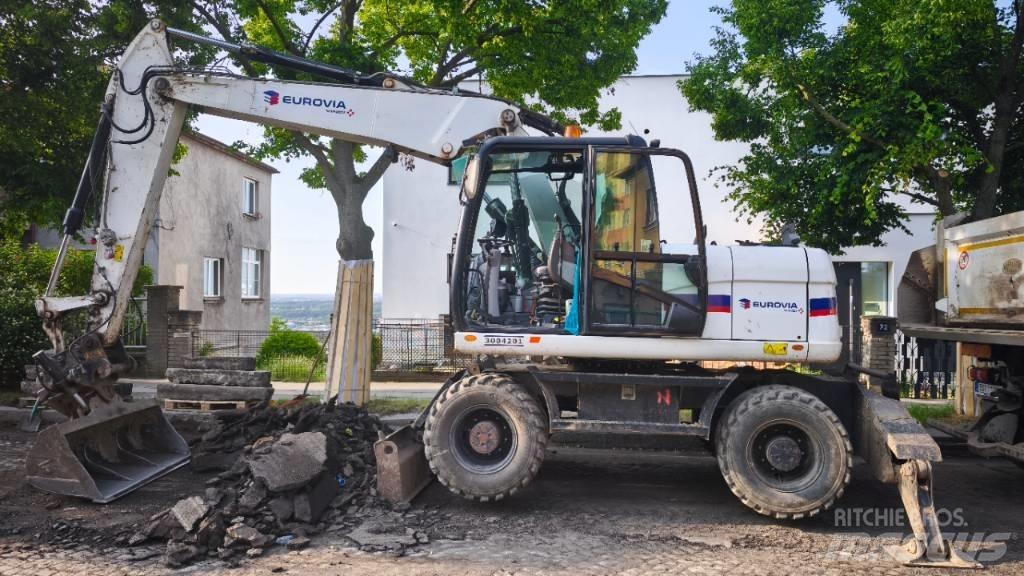 CAT 313 D Wielgraafmachines