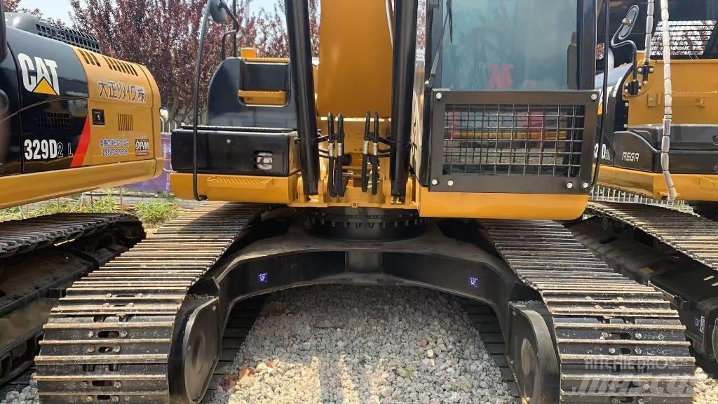 CAT 323 D Rupsgraafmachines