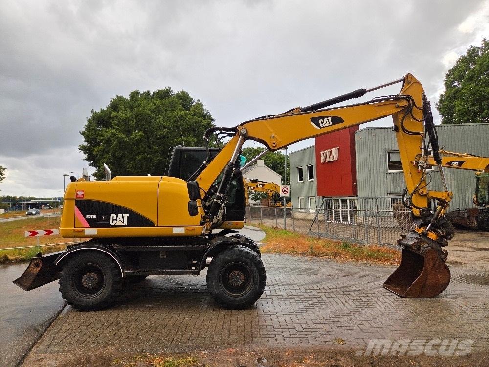 CAT M313D Wielgraafmachines
