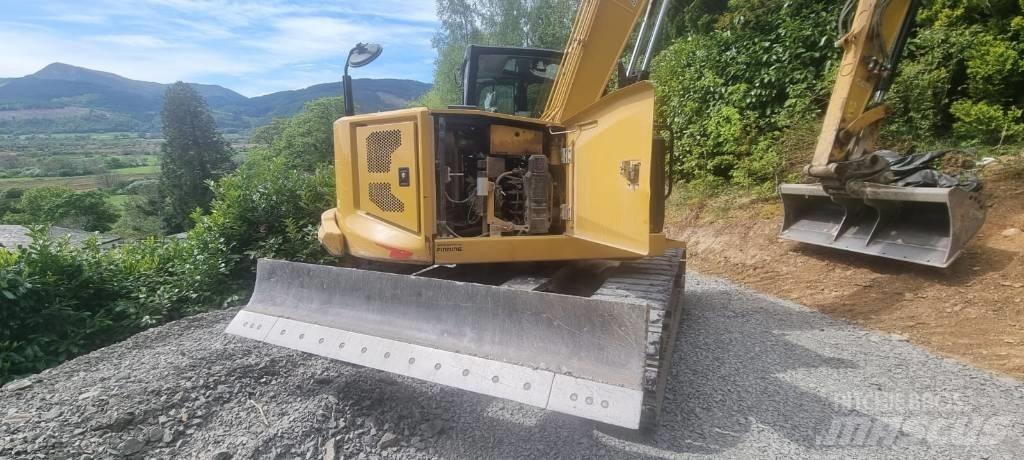 CAT 310 Rupsgraafmachines