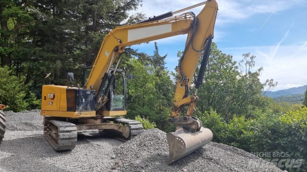 CAT 310 Rupsgraafmachines