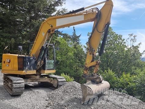 CAT 310 Rupsgraafmachines