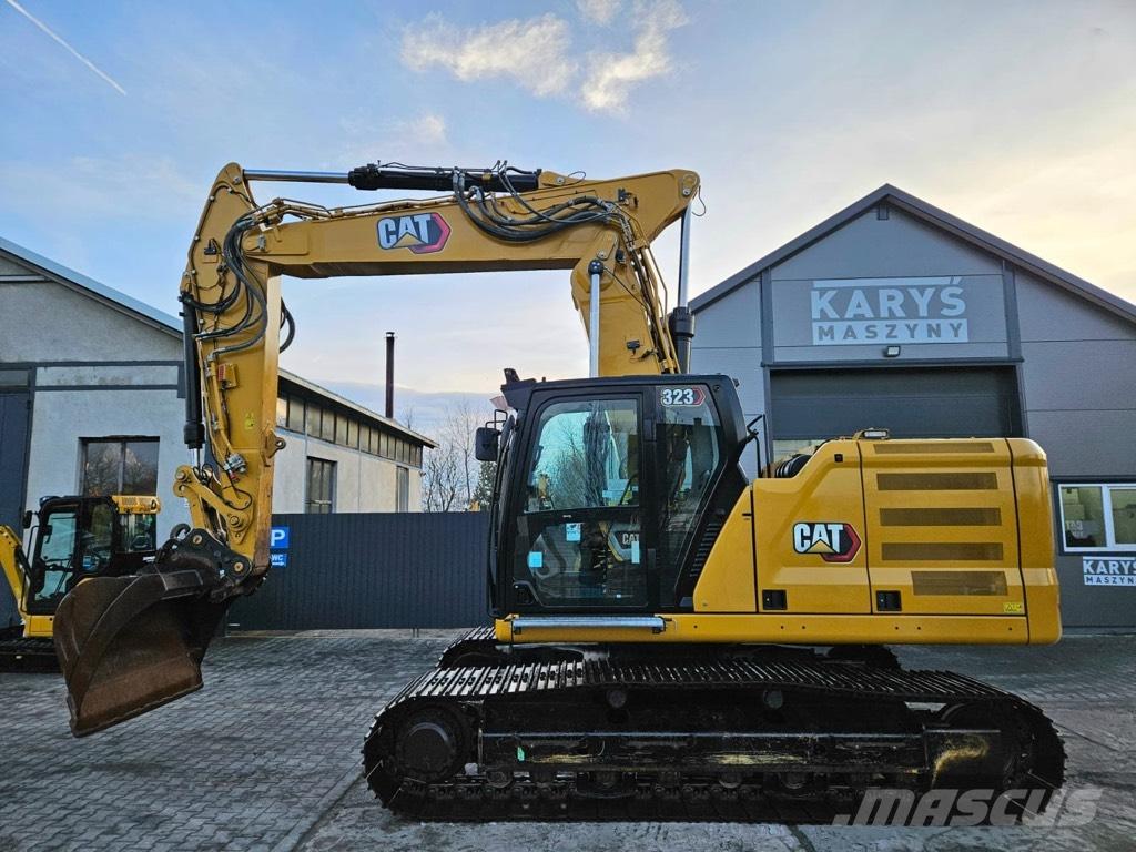 CAT 323 Rupsgraafmachines